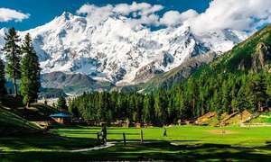 The beautiful fairy meadows reflecting the magnificent Nanga Parbat as one of the best hiking tours in Pakistan.