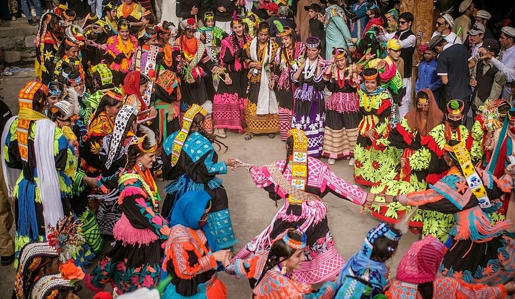 Kalash women performing traditional dance during Joshi festival in Bumburet Valley, Chitral